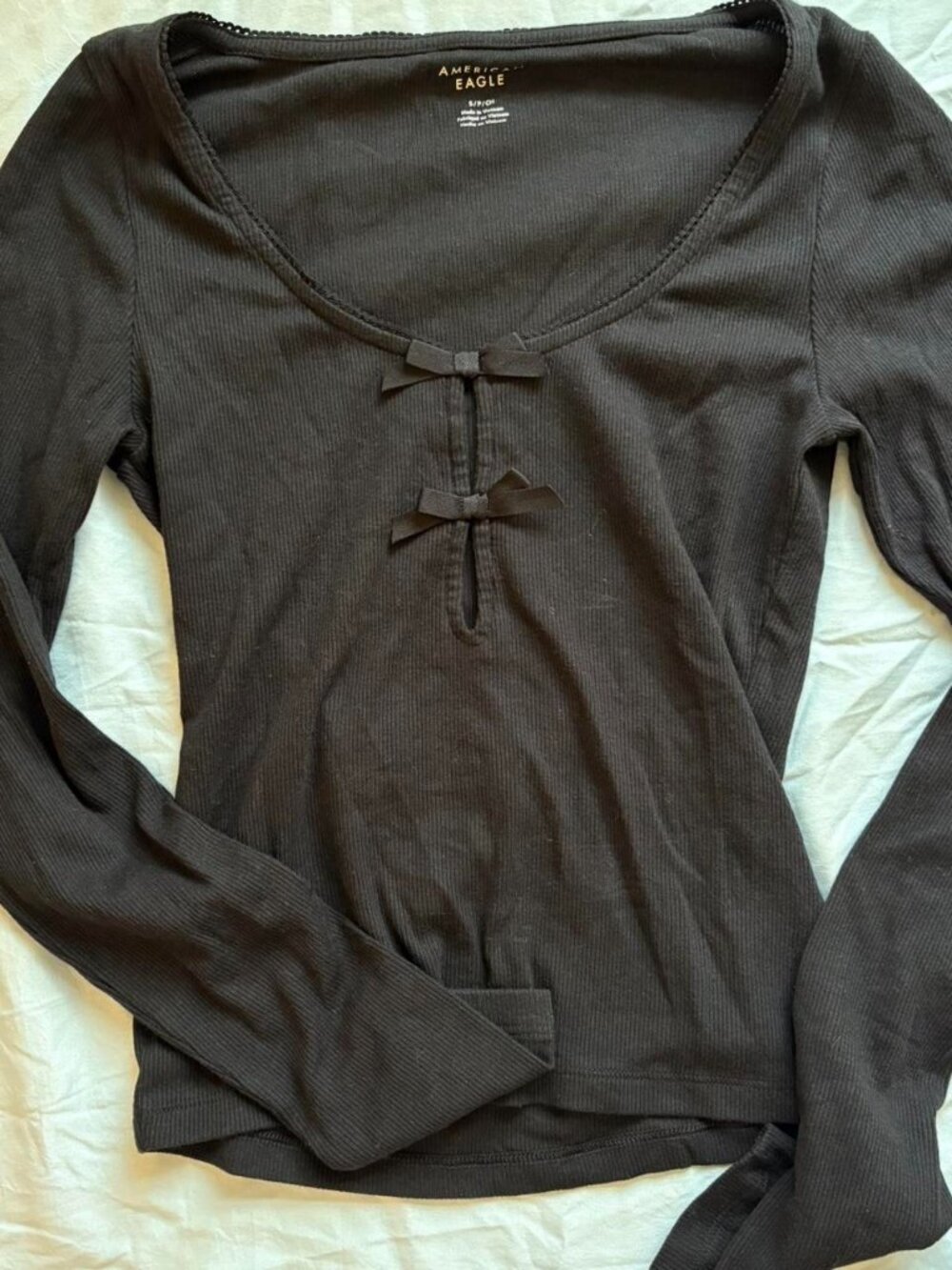 Black American eagle long sleeve top with bows never...